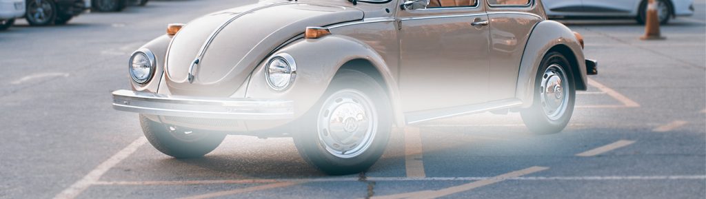 old school beetle vehicle header with blur